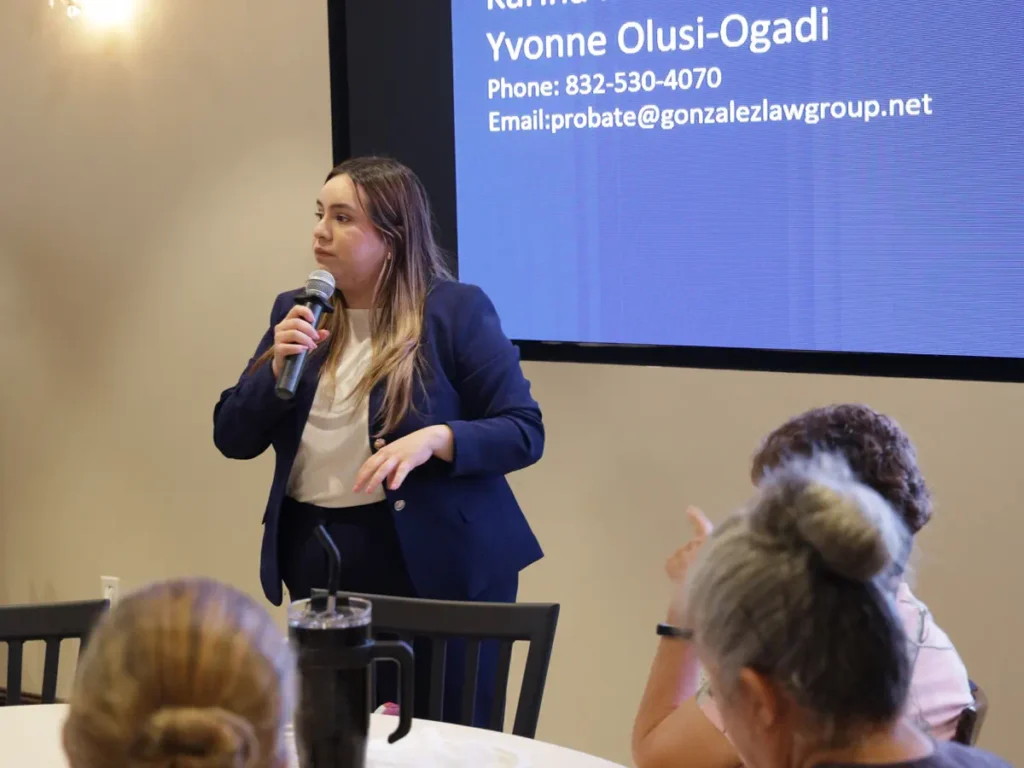 A woman giving presentation at Houston corporate venue - Up Above Venue