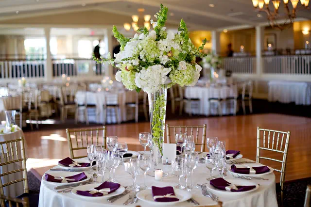 Beautiful table centerpiece with flowers at Houston Social Event Venue - Up Above Venue