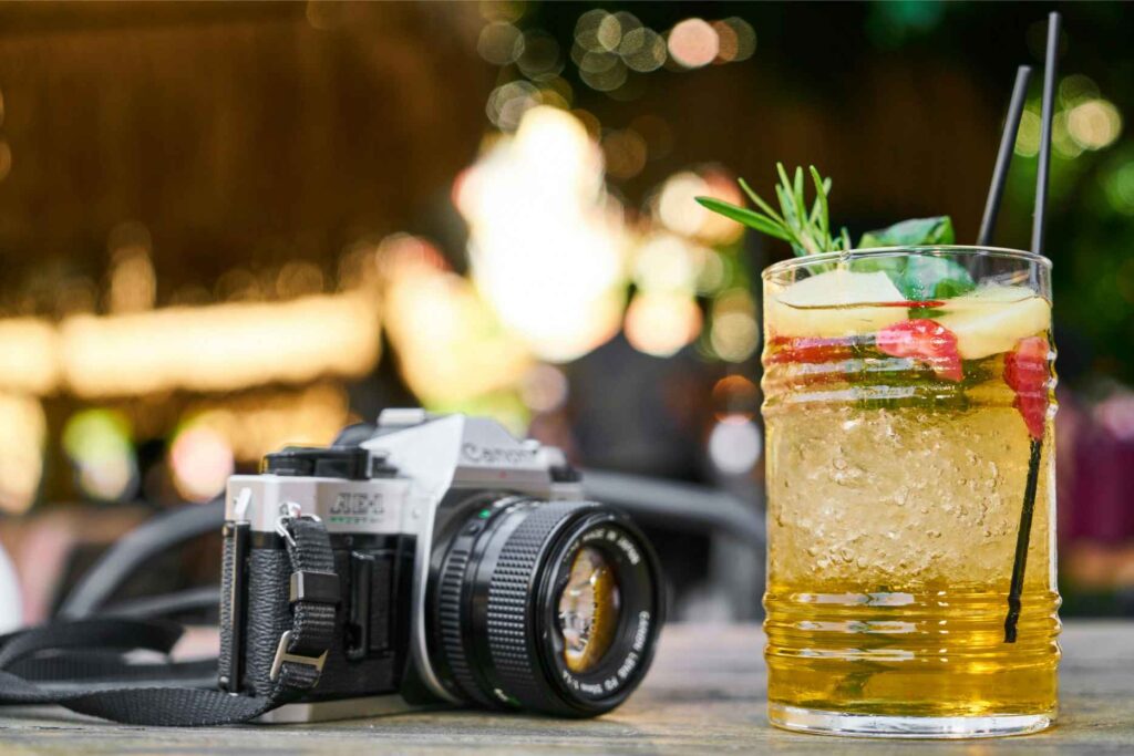 A camera and a cocktail in a wedding ceremony - Up Above Venue